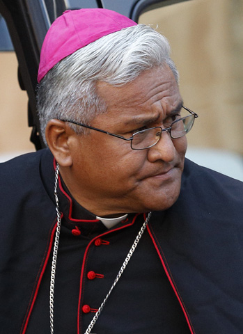 Bishop Soane Patita Paini Mafi of Tonga, an archipelago nation in the southern Pacific Ocean, arrives for the opening session of the extraordinary Synod of Bishops on the family at the Vatican in this Oct. 6, 2014, CNS file photo. Mafi, 53, was one of 20 new cardinals named by Pope Francis. (CNS photo/Paul Haring)