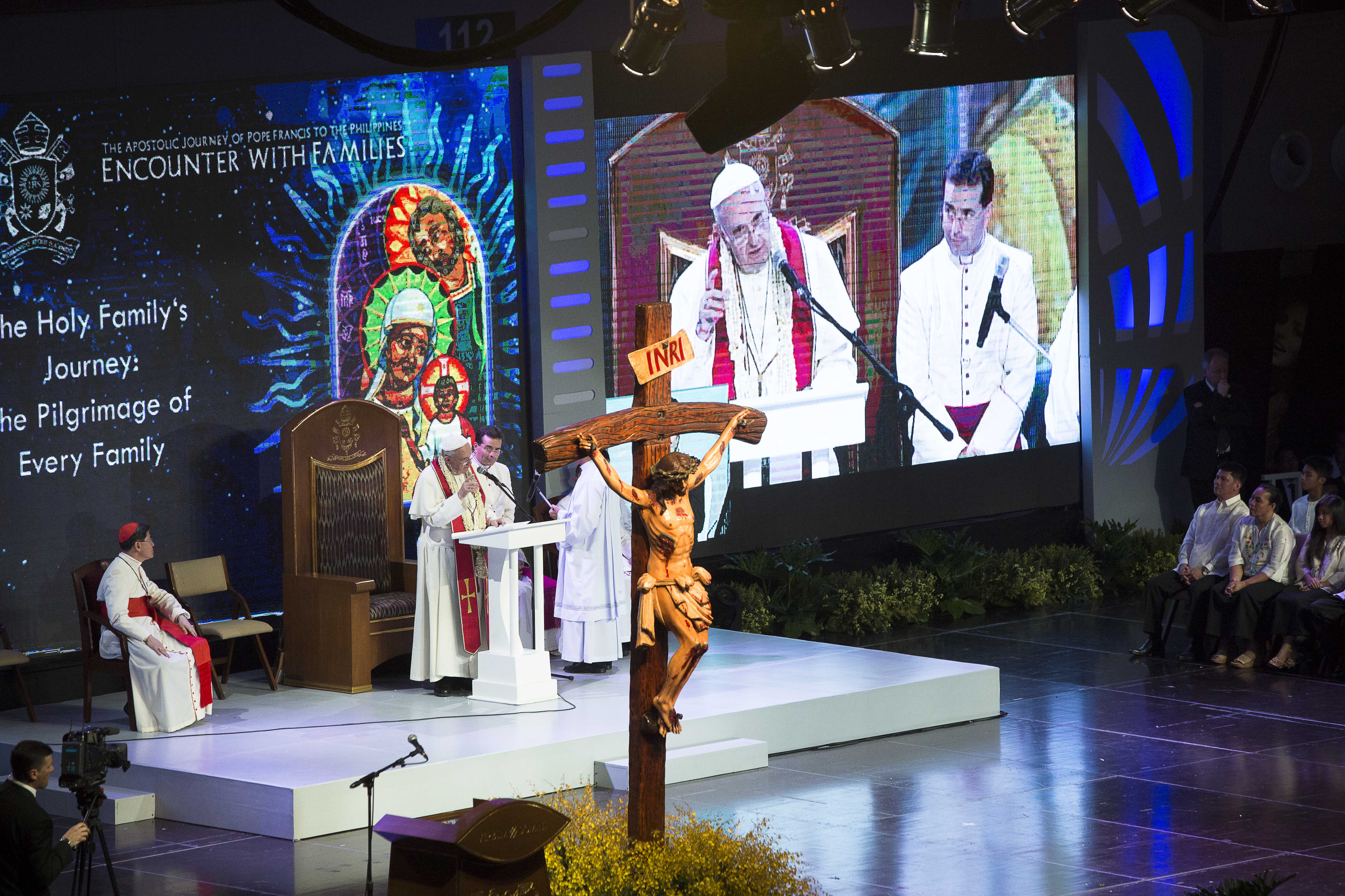 Pope Francis and Cardinal Luis Antonio Tagle of Manila, Philippines, are seen on a big screen during a meeting with families at the Mall of Asia Arena in Pasay City, Philippines, Jan. 16. (CNS/Tyler Orsburn) 