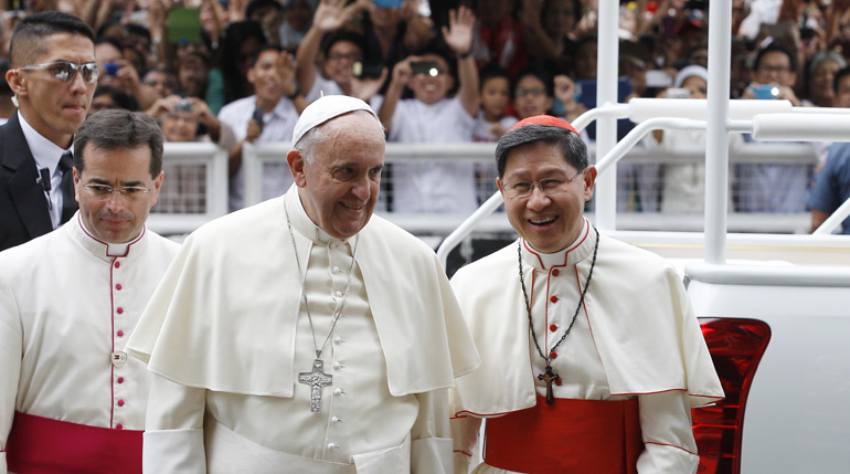 Pope Francis and Cardinal Luis Antonio Tagle of Manila arrive to celebrate Mass in Manila, Philippines, Jan. 16. At the first pan-Asian conference of Catholic moral theologians, Tagle said July 20 that Francis sees the future of the church in Asia.