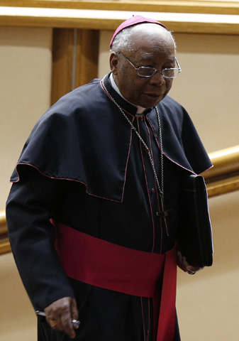 Cardinal-designate Julio Duarte Langa of Xai-Xai, Mozambique, arrives for a meeting with Pope Francis in the synod hall at the Vatican Feb. 12. The pope, cardinals and cardinals-designate were meeting for two days to discuss the reform of the Roman Curia in advance of a Feb. 14 consistory. The pope will create 20 new cardinals at the consistory. (CNS photo/Paul Haring)
