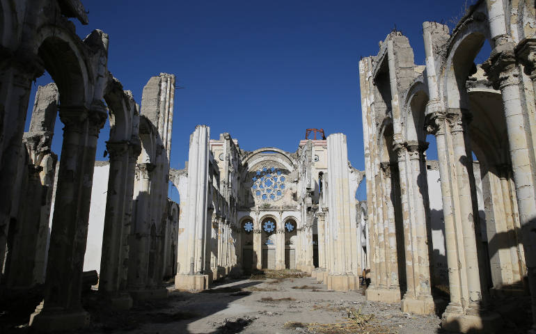 This Feb. 18 photo shows the ruins of Our Lady of the Assumption Cathedral, which was destroyed during the 2010 earthquake in Port-au-Prince, Haiti. Masses are being held at the transitional cathedral which was built next to the historic cathedral. (CNS photo/Bob Roller)