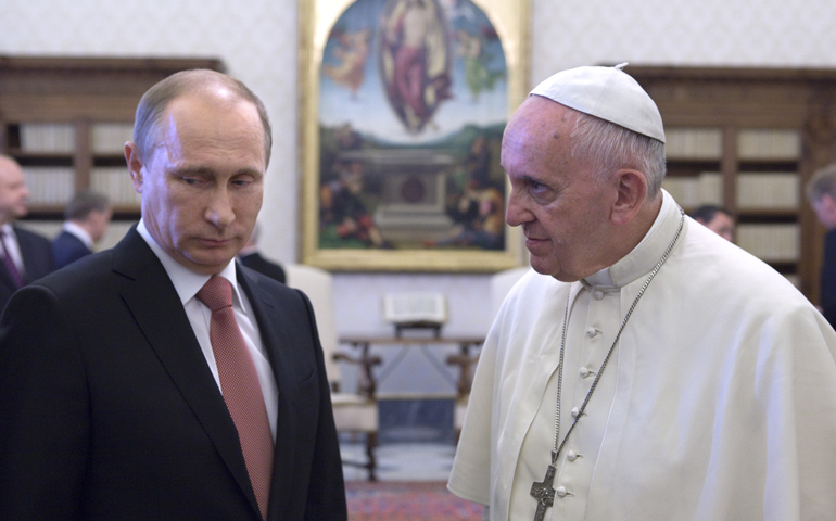 Pope Francis talks to Russian President Vladimir Putin during a private meeting at the Vatican June 10, 2015. (CNS/Maria Grazia Picciarella, pool)