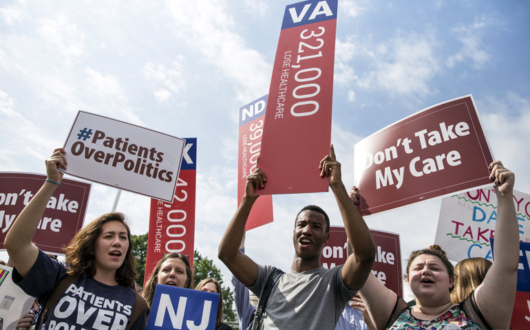 Supporters of the Affordable Care Act rally at the Supreme Court in Washington June 25, 2015. (CNS/Joshua Roberts, Reuters)