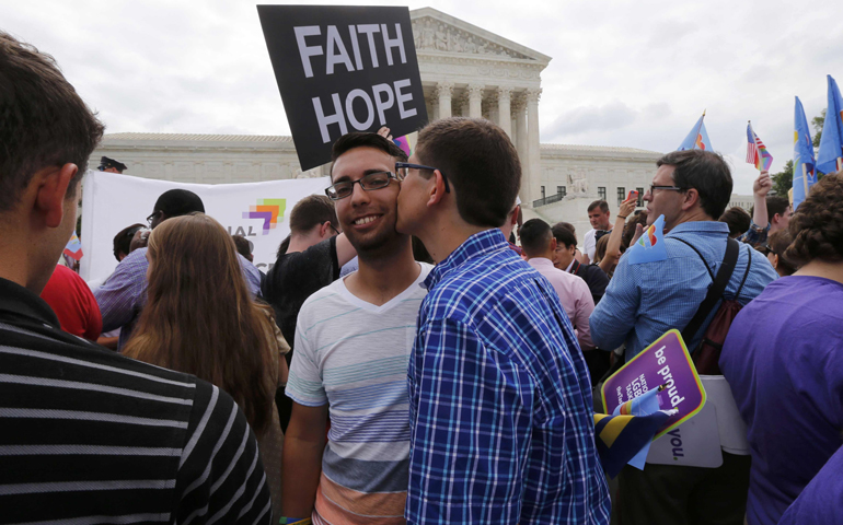 Gay rights supporters celebrate in Washington D.C., June 26, 2015, after the U.S. Supreme Court ruled that the Constitution gives same-sex couples the right to marry. (CNS/Reuters/Jim Bourg)