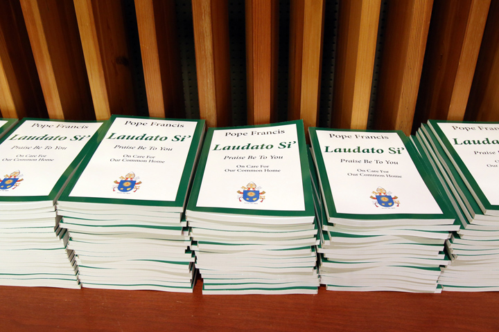 Copies of Pope Francis' encyclical on the environment, "Laudato Si', on Care for Our Common Home," are stacked on a table prior to a presentation on the encyclical June 30 at U.N. headquarters in New York City.(CNS/Gregory A. Shemitz)