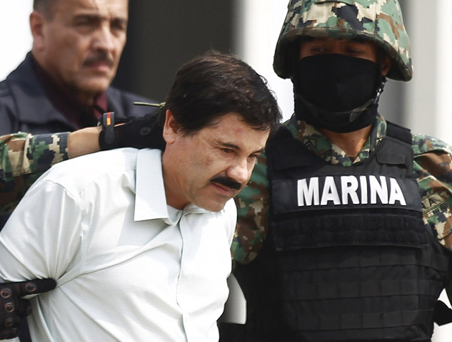 Joaquin "El Chapo" Guzman is escorted by soldiers in 2014 in Mexico City. (CNS/Edgard Garrido, Reuters)