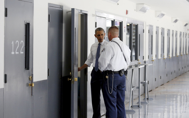 A correctional officer shows President Barack Obama a cell during a visit to El Reno Federal Correctional Institution outside Oklahoma City July 16, 2015. (CNS/Kevin Lamarque, Reuters)