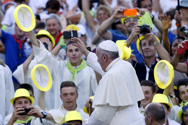 Pope Francis waves as he arrives to attend an audience with some 9,000 altar servers in St. Peter's Square at the Vatican Aug. 4. (CNS photo/Giampiero Sposito, Reuters)