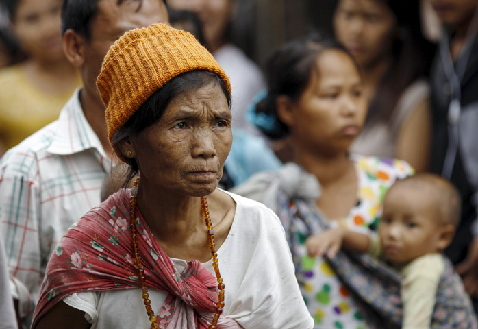 Ethnic Kachin refugees gather July 31 at a camp in Myitkyina, Myanmar. (CNS /Soe Zeya Tun, Reuters)