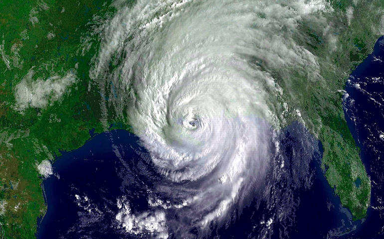 In this satellite image dated Aug. 29, 2015, Hurricane Katrina makes its way through the U.S. Gulf Coast. (CNS photo/ National Oceanic and Atmospheric Administration via EPA)