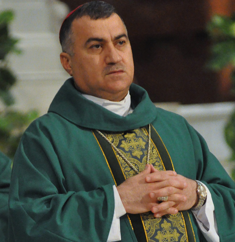 Chaldean Catholic Archbishop Bashar Warda of Irbil, Iraq, concelebrates an Aug. 23 Mass at SS. Peter and Paul Cathedral in Indianapolis. The archbishop visited several U.S. cities and discussed his experience with the flood of Christian refugees to Irbil following the Islamic State's capture of Mosul and the Ninevah Plain. (CNS/Sean Gallagher, The Criterion)