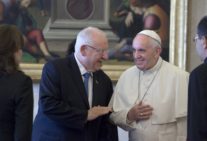 Pope Francis smiles as he meets with Israeli President Reuven Rivlin during a private audience in the pontiff's private library at the Vatican Sept. 3. (CNS/Maria Grazia Picciarella)