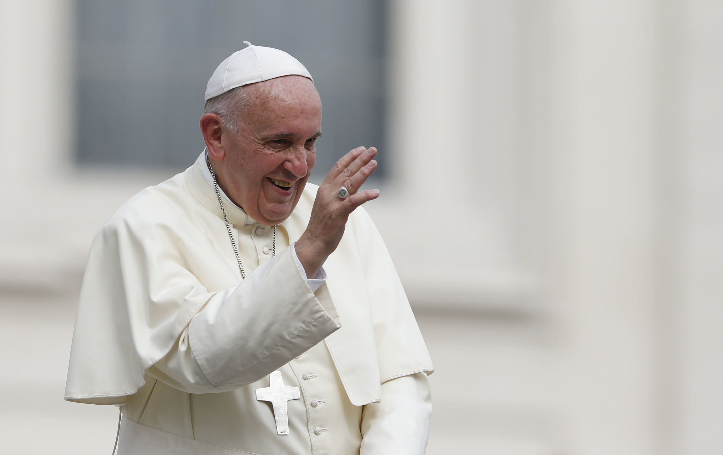 Pope Francis waves as he leaves his general audience in St. Peter's Square at the Vatican Sept. 16. (CNS/Paul Haring)