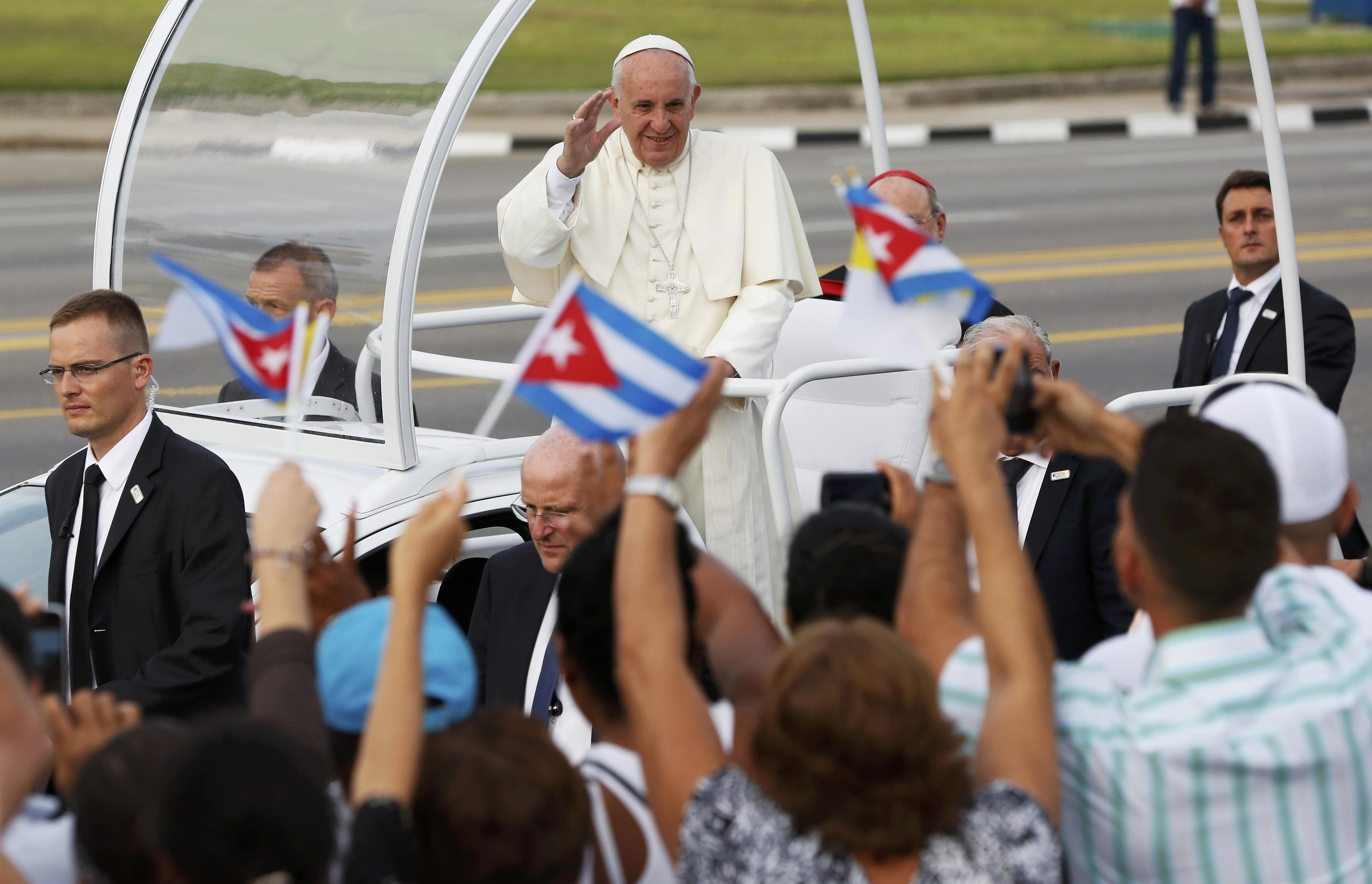 Pope Francis waves to the crowd as he arrives to celebrate Mass in Revolution Square in Havana Sept. 20. (CNS/Reuters/Carlos Garcia Rawlins)