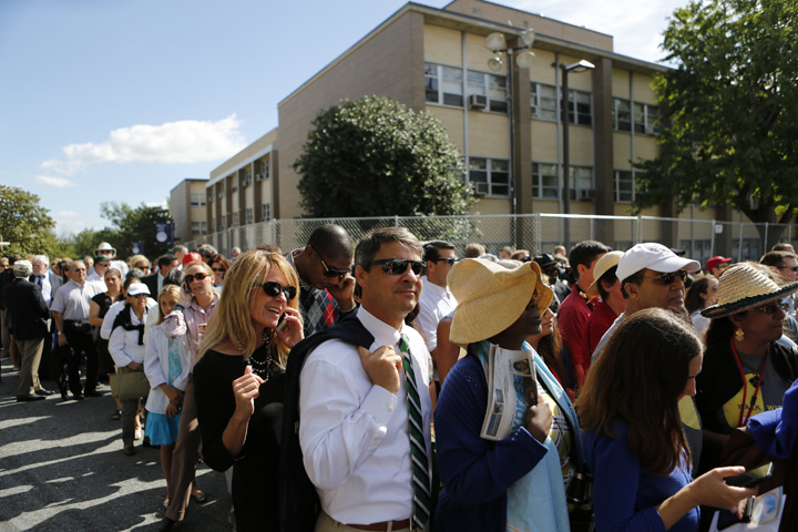 People wait to go through security to attend the canonization Mass for Blessed Junipero Serra outside the Basilica of the National Shrine of the Immaculate Conception in Washington Sept. 23. (CNS photo/Bob Roller)