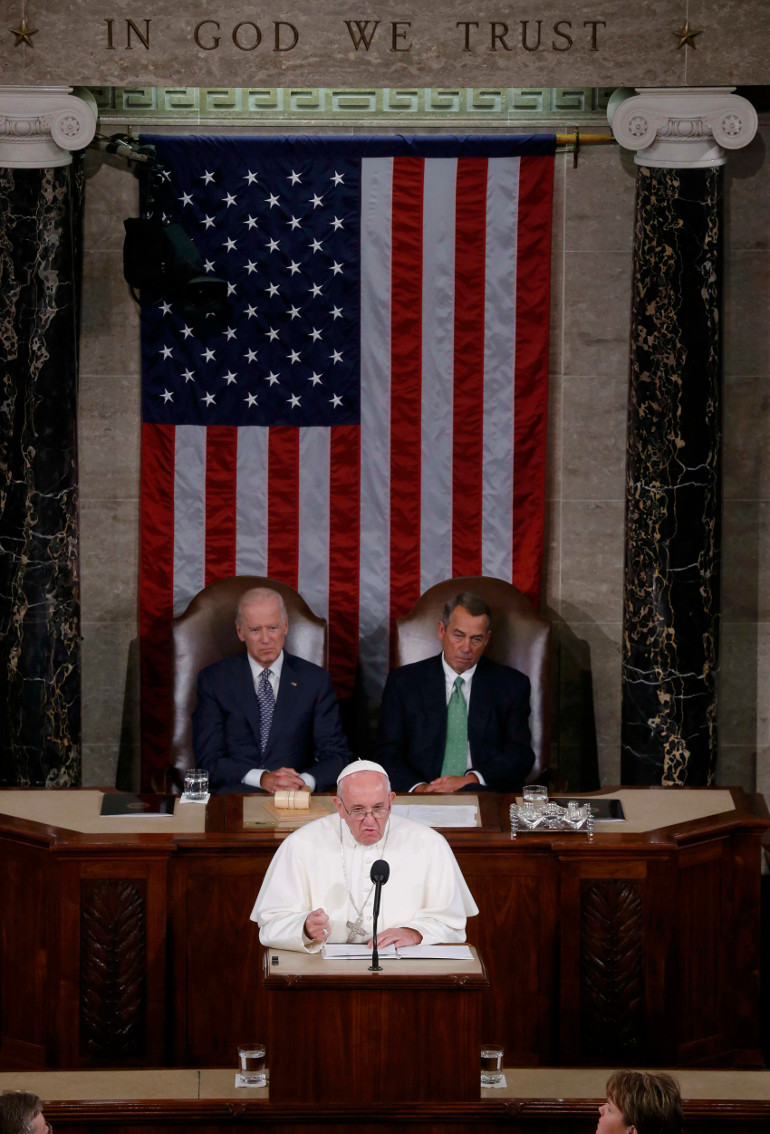 Pope Francis addresses a joint meeting of the U.S. Congress as Vice President Joe Biden (left) and Speaker of the House John Boehner look on in the House of Representatives Chamber at the U.S. Capitol in Washington Sept. 24. (CNS/Reuters/Jim Bourg)
