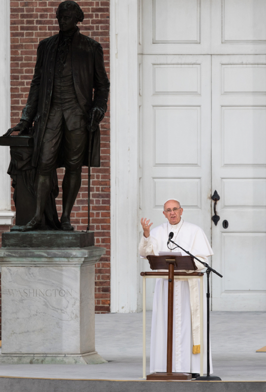 Pope Francis delivers an address at Independence Mall in Philadelphia Sept. 26. He spoke near a statue of George Washington to an estimated crowd of 50,000 people. (CNS photo/Lisa Johnston, St. Louis Review) 