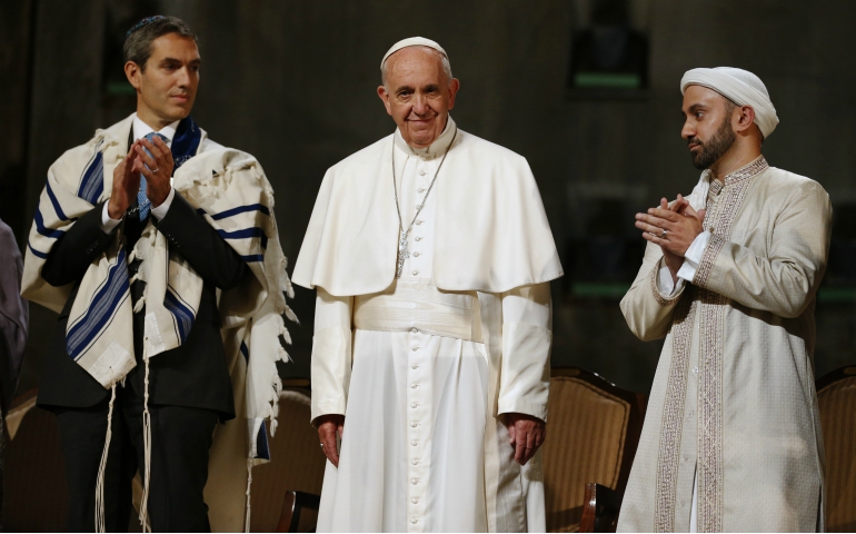 Pope Francis stands with Rabbi Elliot Cosgrove, left, and Iman Khalid Latif, right, at an interreligious gathering Sept. 25, 2015, at the the 9/11 Memorial Museum in New York. (CNS/Jin Lee, pool)