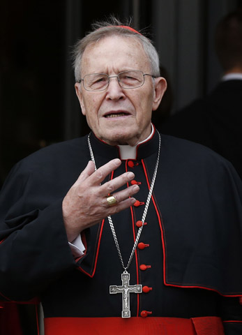 German Cardinal Walter Kasper gestures as he leaves a session of the Synod of Bishops on the family at the Vatican Oct. 6. (CNS/Paul Haring) 