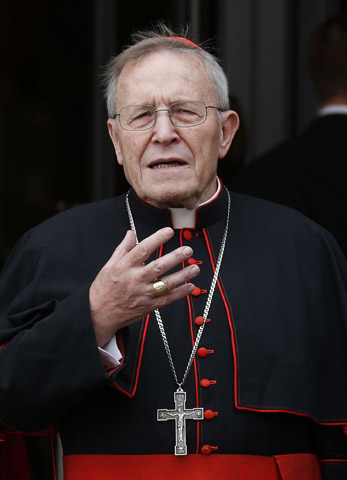 German Cardinal Walter Kasper gestures as he leaves a session of the Synod of Bishops on the family at the Vatican Oct. 6. (CNS/Paul Haring)