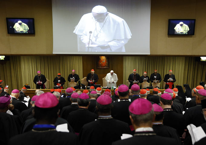 Pope Francis presides at a session of the Synod of Bishops on the family at the Vatican Oct. 15. (CNS/Paul Haring)