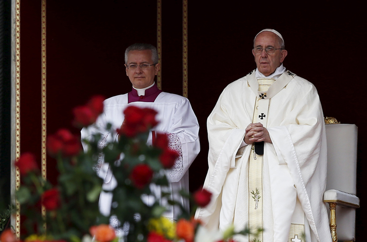 Pope Francis leads the Oct. 18 Mass for the canonization of Spanish Sister Maria of the Immaculate Conception, a member of the Congregation of the Sisters of the Company of the Cross; Italian Father Vincenzo Grossi, founder of the Institute of the Daughters of the Oratory; and Louis and Marie Zelie Guerin Martin, parents of St. Therese of Lisieux, in St. Peter's Square at the Vatican. (CNS photo/Alessandro Bianchi, Reuters)