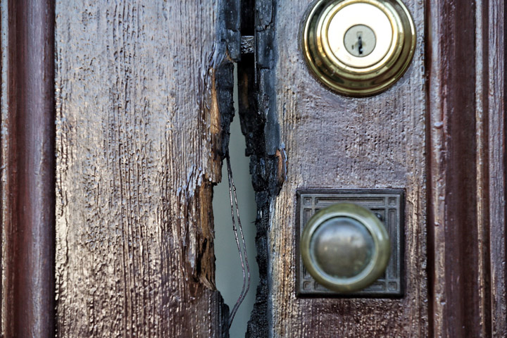 The door of the Shrine of St. Joseph near downtown St. Louis shows burn marks in this Oct. 22 photo. Civil authorities are investigating fires set at a number of the city's churches. (CNS/Lisa Johnston, St. Louis Review)