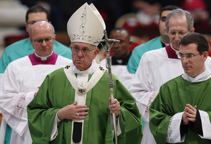 Pope Francis leaves after celebrating the closing Mass of the Synod of Bishops on the family in St. Peter's Basilica at the Vatican Oct. 25. (CNS/Paul Haring)