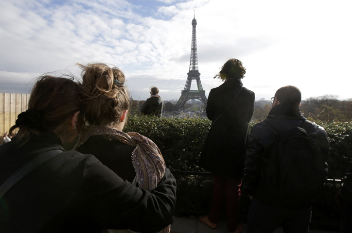 People observe a minute of silence at the Trocadero in Paris Nov. 16. (CNS/Philippe Wojazer, Reuters) 
