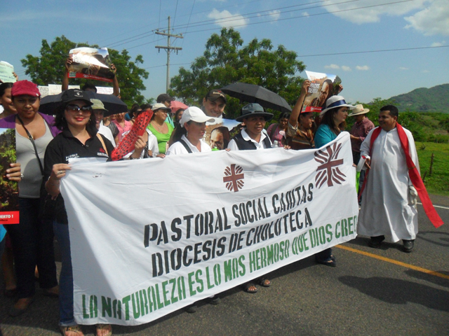 Fr. Bernardino Lazo, far right, joins a protest in 2014 with Caritas Choluteca in Jicaro Galan, department of Valle, Honduras. (CNS/Mary Duran) 
