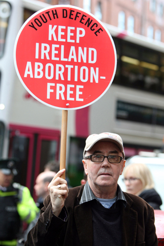 A pro-life supporter demonstrates in 2012 outside the Marie Stopes clinic in Belfast, Northern Ireland. (CNS/Paul Mcerlane, EPA)