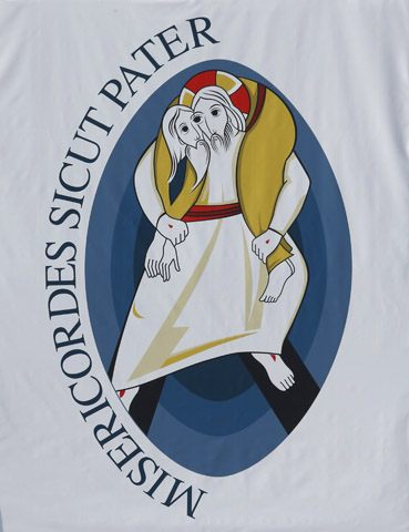 The logo for the Holy Year of Mercy on a banner (CNS/Paul Haring)
