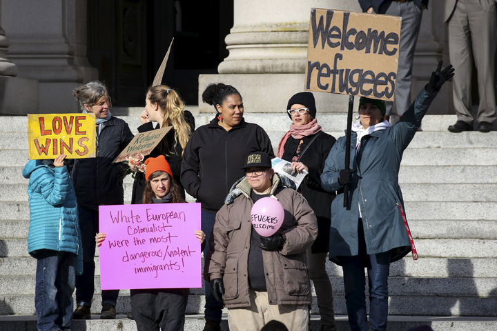 People gather Nov. 20 outside the Washington State capitol in Olympia to urge the United States' acceptance of Syrian refugees. (CNS/David Ryder, Reuters)