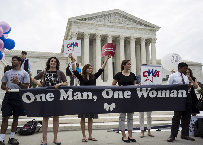 Supporters of traditional marriage rally in front of the U.S. Supreme Court in Washington June 26. (CNS/Joshua Roberts, Reuters)