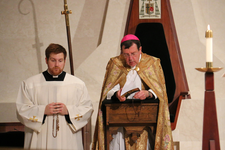 Detroit Archbishop Allen H. Vigneron and Fr. Stephen Pullis. (CNS/Jonathan Francis, Archdiocese of Detroit)