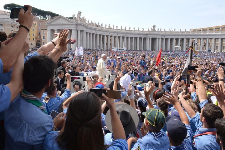 A large crowd greets Pope Francis as he arrives for an audience in mid-June in St. Peter's Square at the Vatican. (CNS/Maurizio Brambatti, EPA)