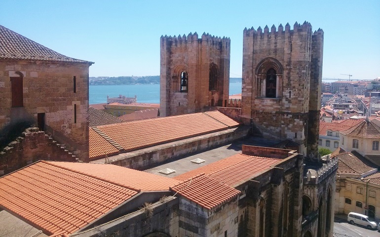 A view of Se Cathedral's bell towers from Museu do Aljube’s fourth-floor balcony in Lisbon, Portugal (Mariam Williams)