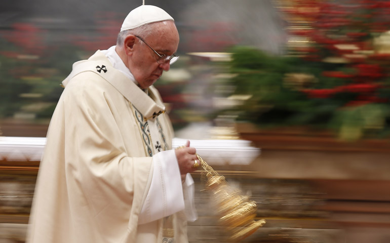 Pope Francis uses incense as he celebrates Mass marking the feast of the Epiphany in St. Peter's Basilica at the Vatican Jan. 6. (CNS/Paul Haring)