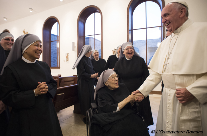 Pope Francis greets Sr. Marie Mathilde, 102, during his unannounced visit to the Little Sisters of the Poor residence in Washington Sept. 23. (CNS/L'Osservatore Romano)