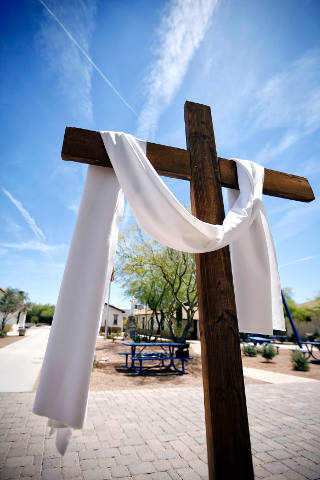 In this April 30, 2015, file photo, a cross draped with a white sash for Easter is seen on the campus of St. Peter Indian Mission School in Bapchule, Ariz. (CNS photo/Nancy Wiechec)
