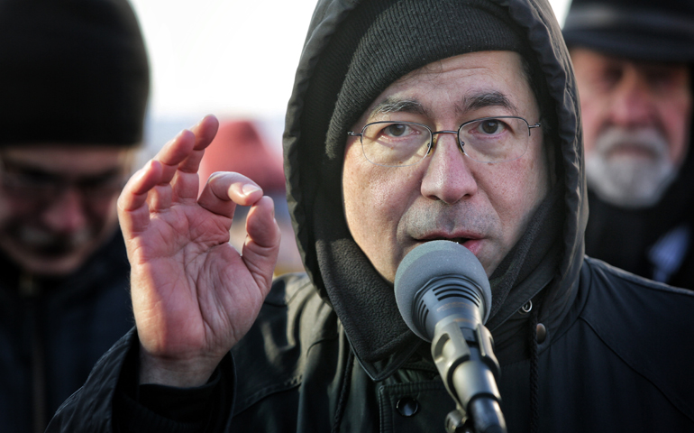 Fr. Frank Pavone speaks during a prayer and protest rally outside of the Planned Parenthood building in Washington Jan. 21, the day before the annual March for Life. (CNS/Lisa Johnston, St. Louis Review)