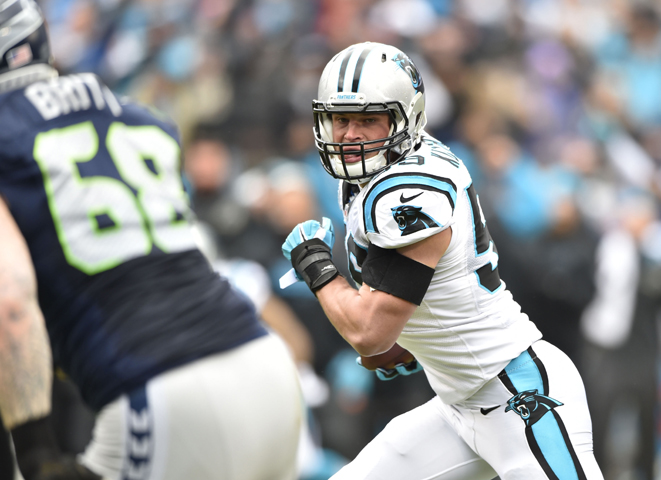Carolina Panthers middle linebacker Luke Kuechly returns an interception for a touchdown Jan. 17 against the Seattle Seahawks. (CNS/Bob Donnan-USA TODAY Sports/Reuters) 