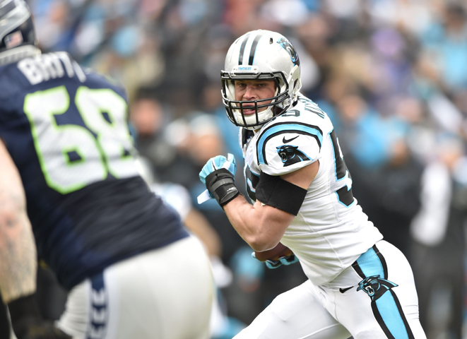 Carolina Panthers middle linebacker Luke Kuechly returns an interception for a touchdown Jan. 17 against the Seattle Seahawks. (CNS/Bob Donnan-USA TODAY Sports/Reuters)