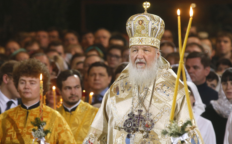 Russian Orthodox Patriarch Kirill reads a payer during the Christmas service Jan. 7 in Moscow.  (CNS/Sergei Chirikov, EPA)