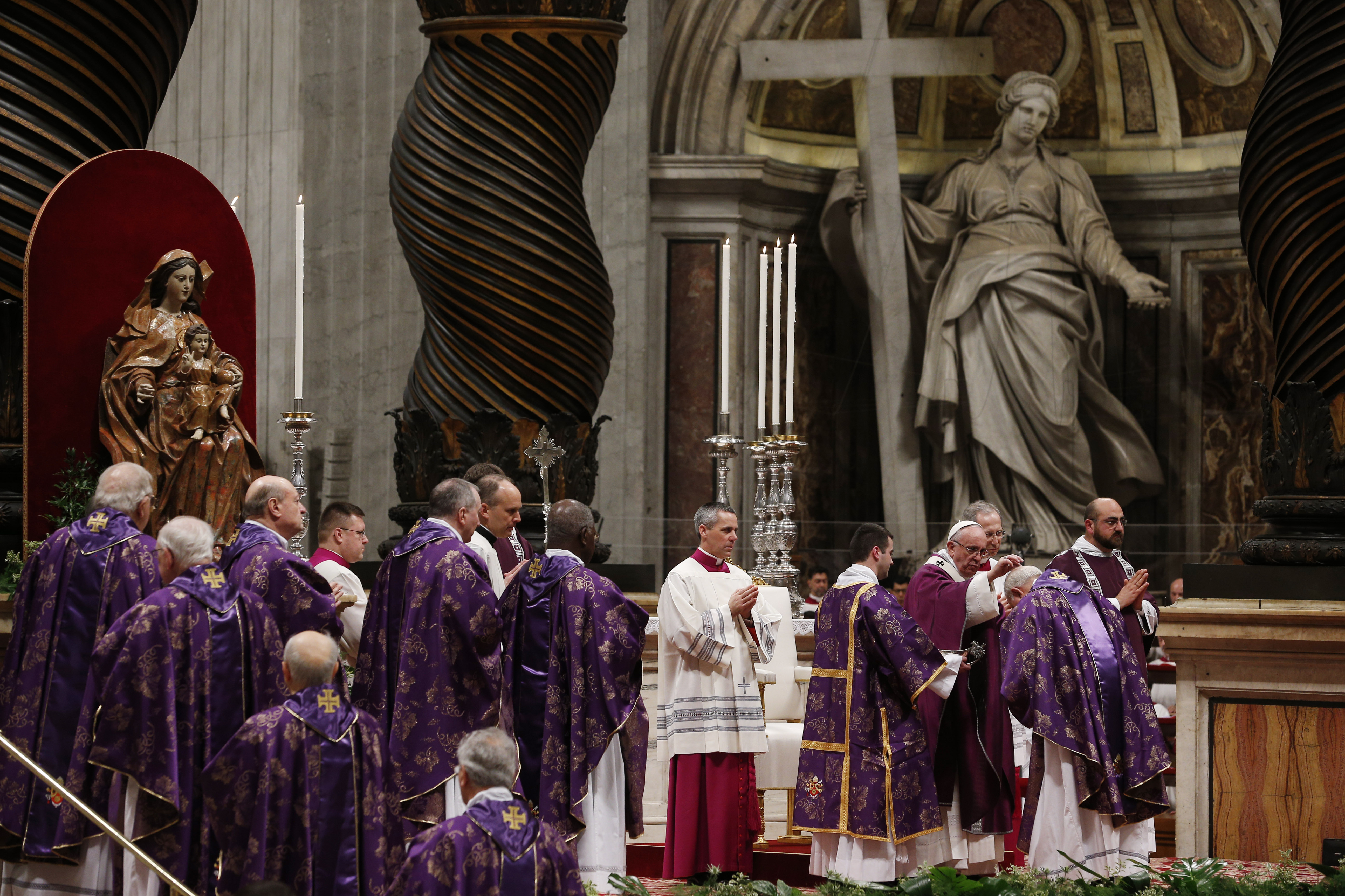 Pope Francis places ashes on cardinals during Ash Wednesday Mass in St. Peter's Basilica at the Vatican Feb. 10. (CNS/Paul Haring)