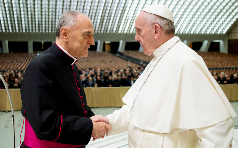 Pope Francis greets Msgr. Pio Vito Pinto, dean of the Roman Rota, in Paul VI hall at the Vatican March 12. (CNS/L'Osservatore Romano)