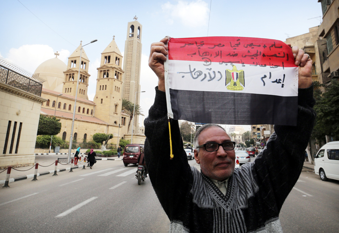 A man in Cairo Feb. 16 denounces the killing of Egyptian Christians in Libya. (CNS/Khaled Elfiqi, EPA) 