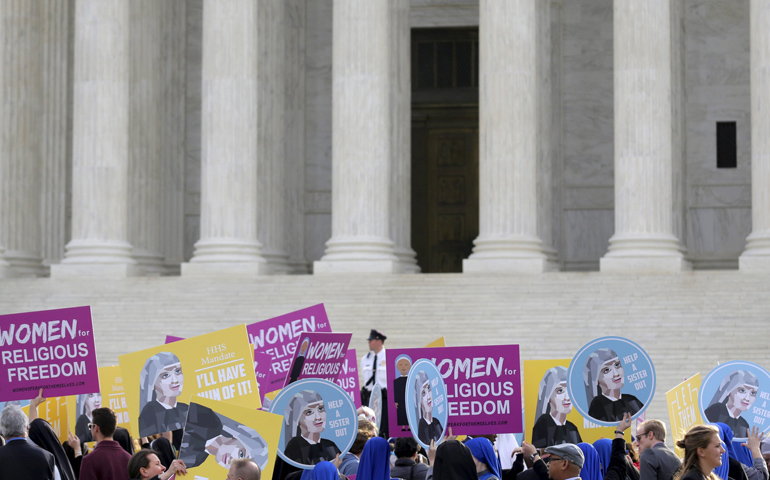 Women religious and others demonstrate against the Affordable Care Act's contraceptive mandate March 23 near the steps of the U.S. Supreme Court in Washington. (CNS/Joshua Roberts, Reuters)