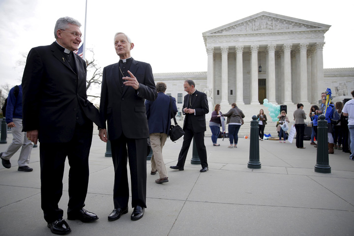 Bishop David Zubik of Pittsburgh and Cardinal Donald Wuerl of Washington near the U.S. Supreme Court March 23 in Washington. (CNS/Joshua Roberts, Reuters)