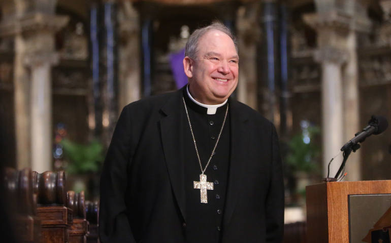 Archbishop Bernard A. Hebda smiles as he addresses the media at a news conference March 24 at the Cathedral of St. Paul in St. Paul, Minn., announcing his appointment as archbishop of St. Paul and Minneapolis. (CNS photo/Dave Hrbacek, The Catholic Spirit)